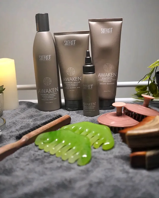 Surface Awaken products and gua sha combs used in the head spa